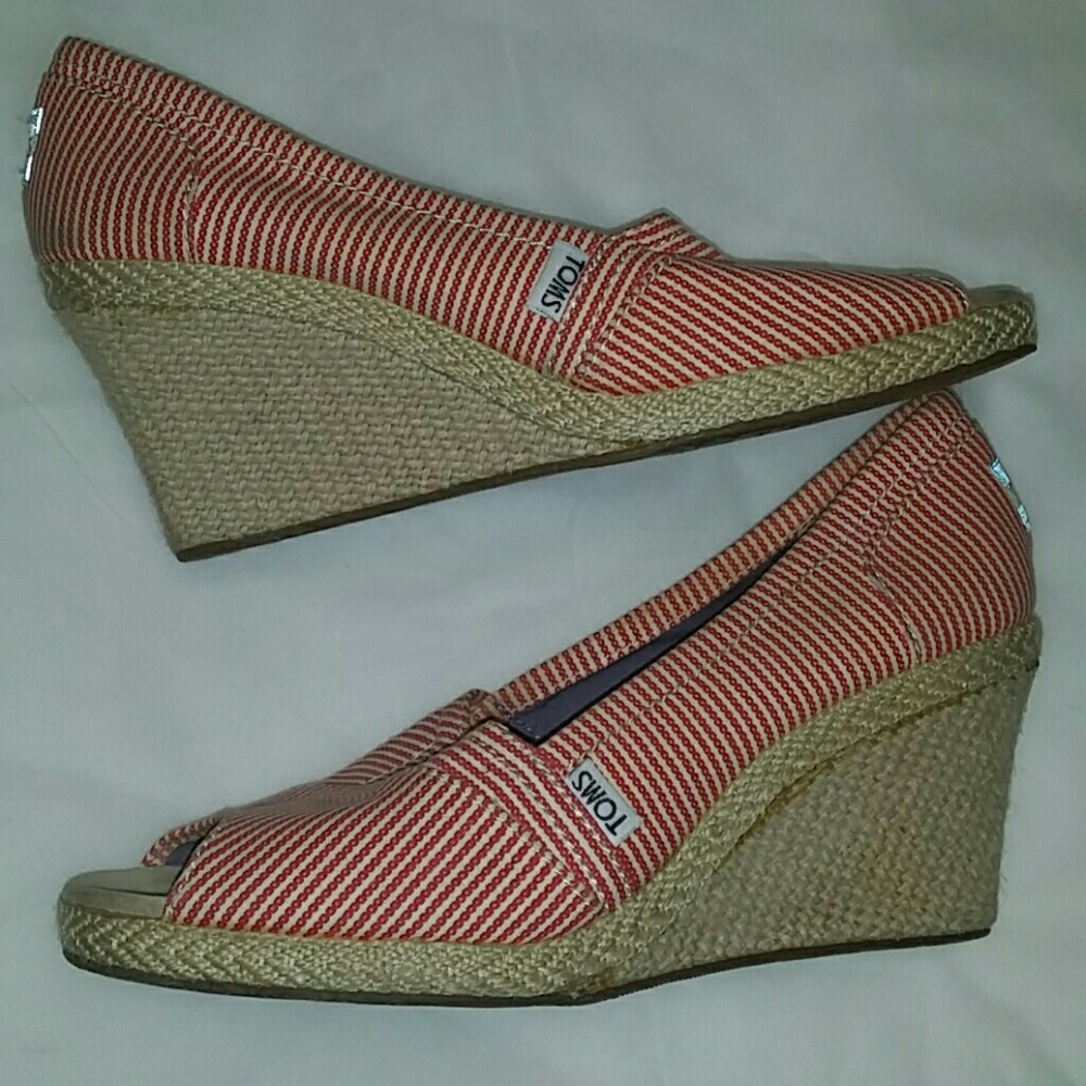 Red and white open toe Toms shoes