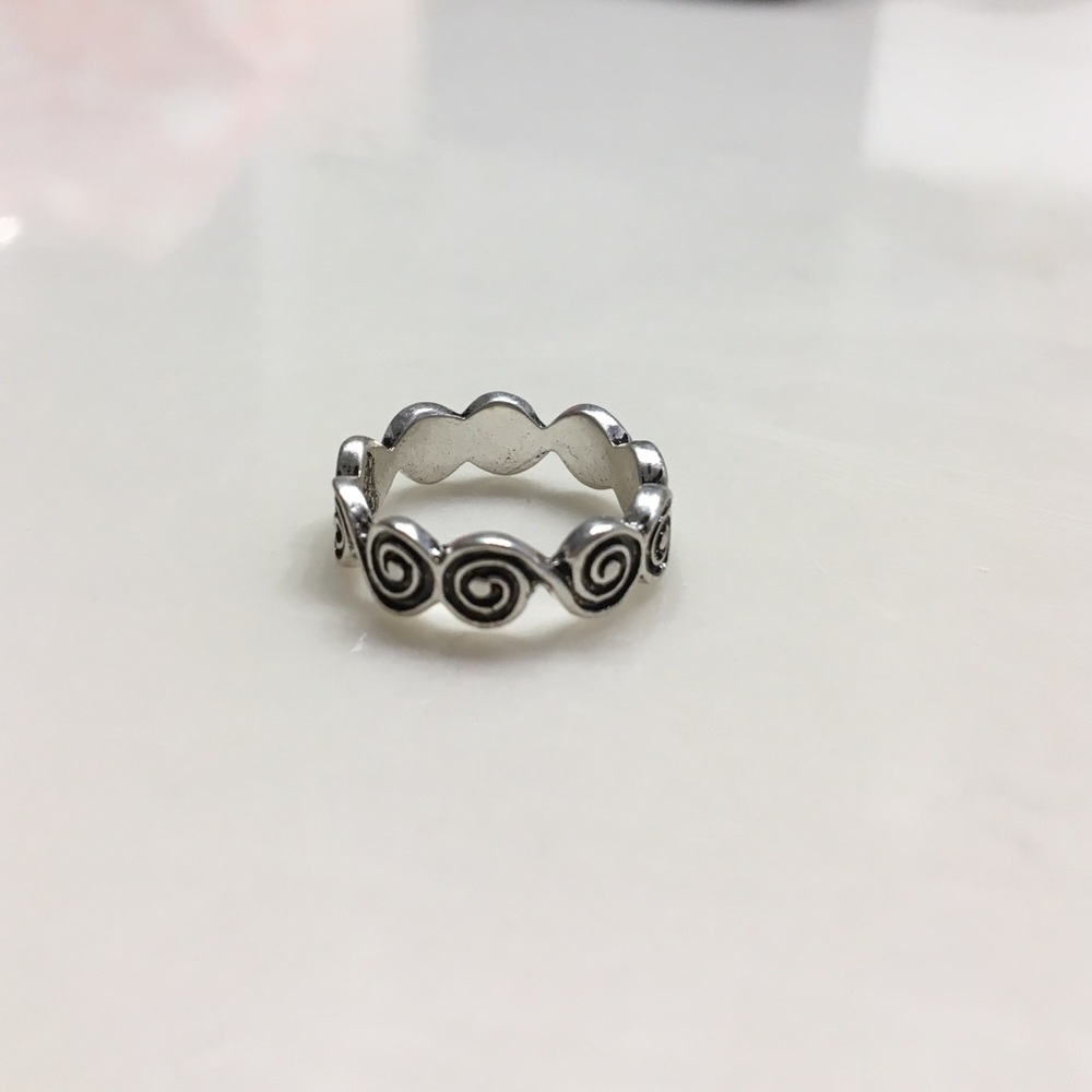 Silver boho swirl band ring.