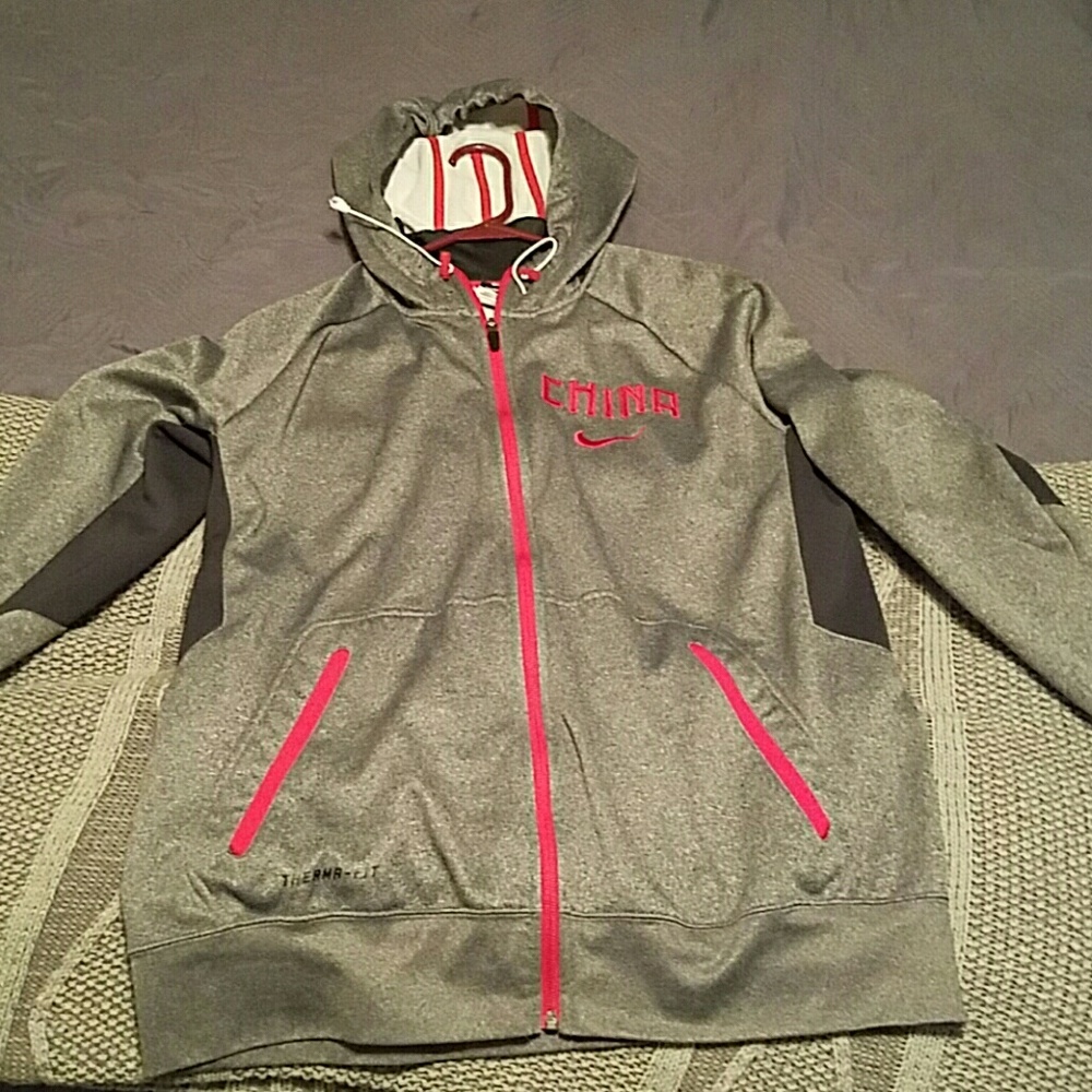 Nike Therma-fit jacket. Grey with red China logo.