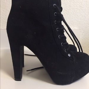 Lace up high heel booties