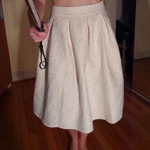 White skirt with a floral pattern