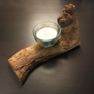 Candle on a log