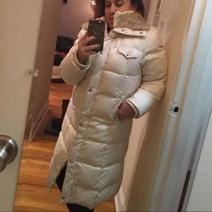 Esprit Long down coat with a fake fur collar.