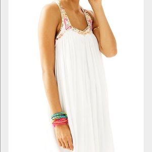 Lilly white trapeze dress w/beading detail. Sz S.