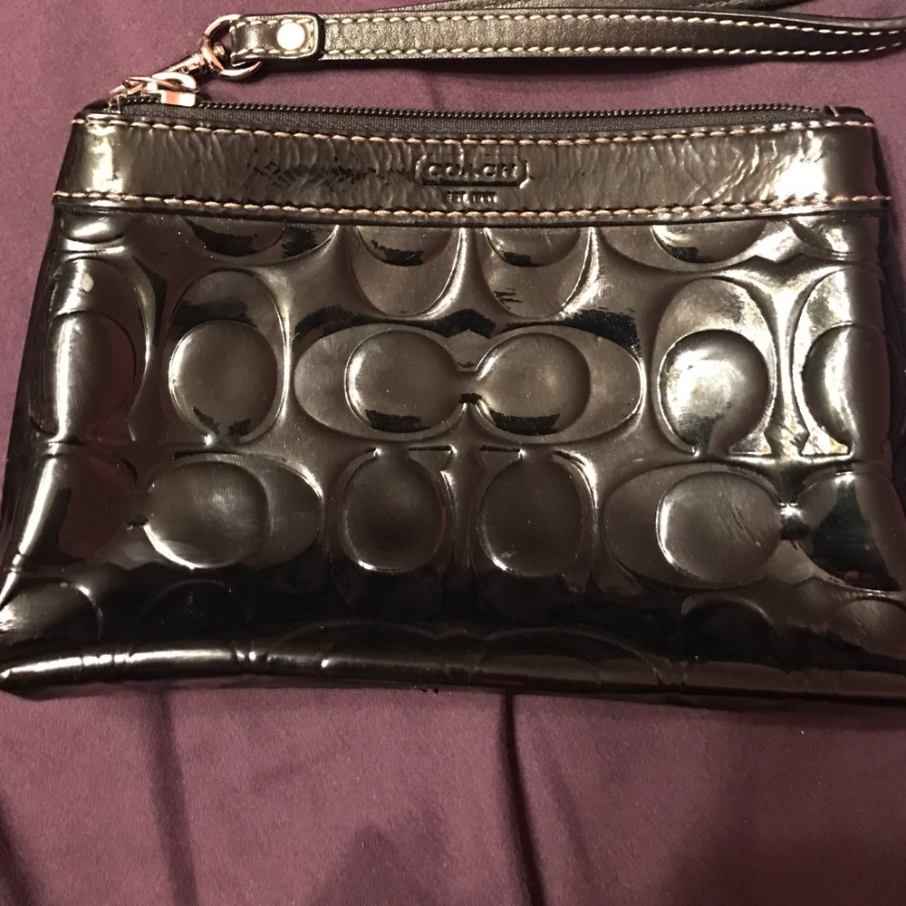 Coach black patent leather embossed C's