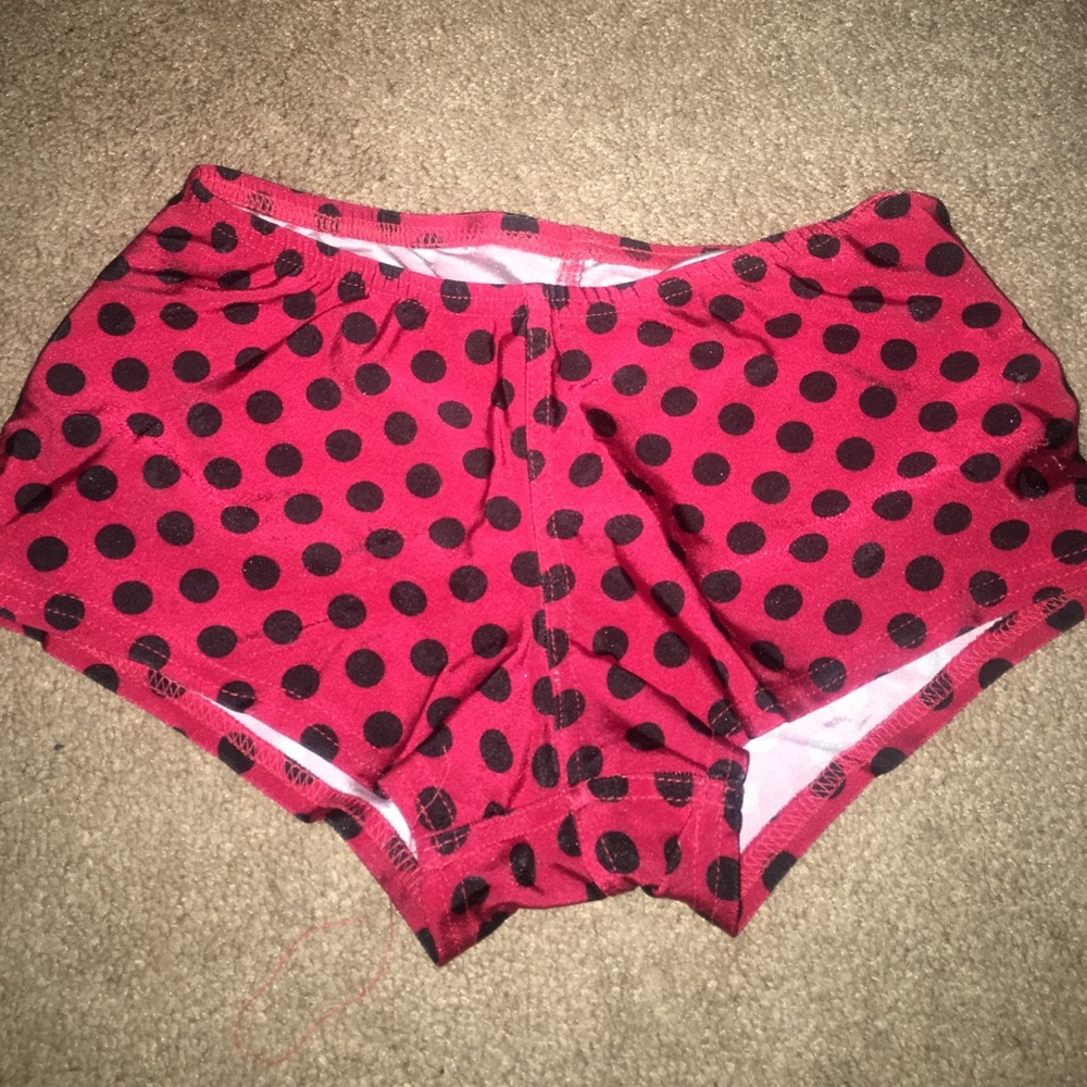 Red with black polka dot derby skinz
