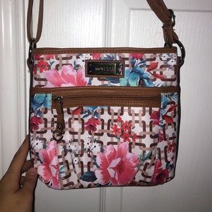 NEVER been used Rosetti adjustable purse!