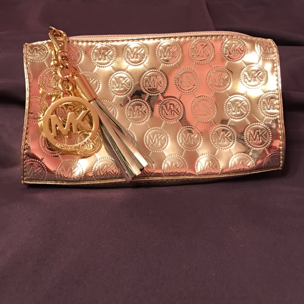 Michael Kors gold makeup bag