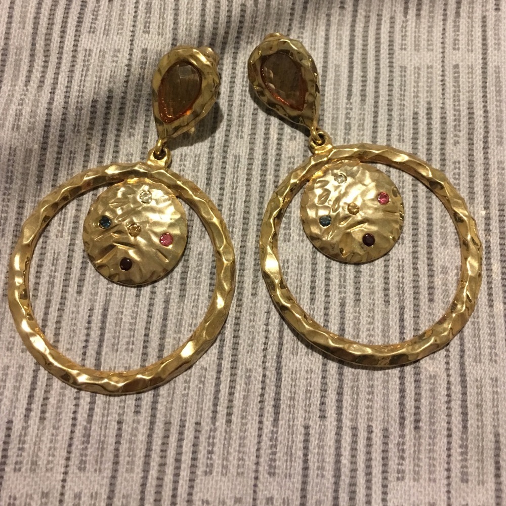 Never worn fashion earrings.