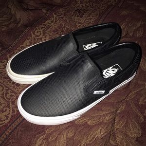 Black Leather Van's slip on in Men 6 and women 7.5