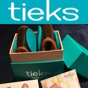 Chestnut Tieks (size 5)