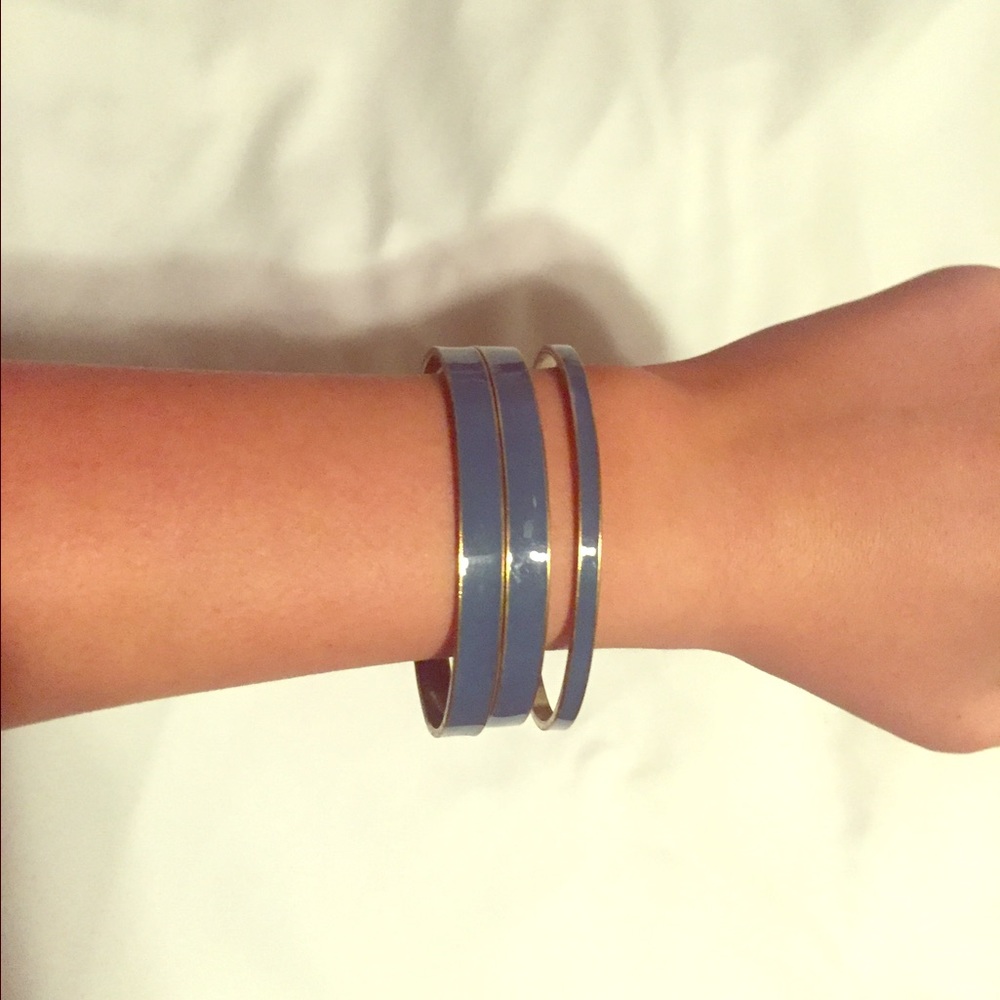 Set of three blue with gold rimmed bracelets