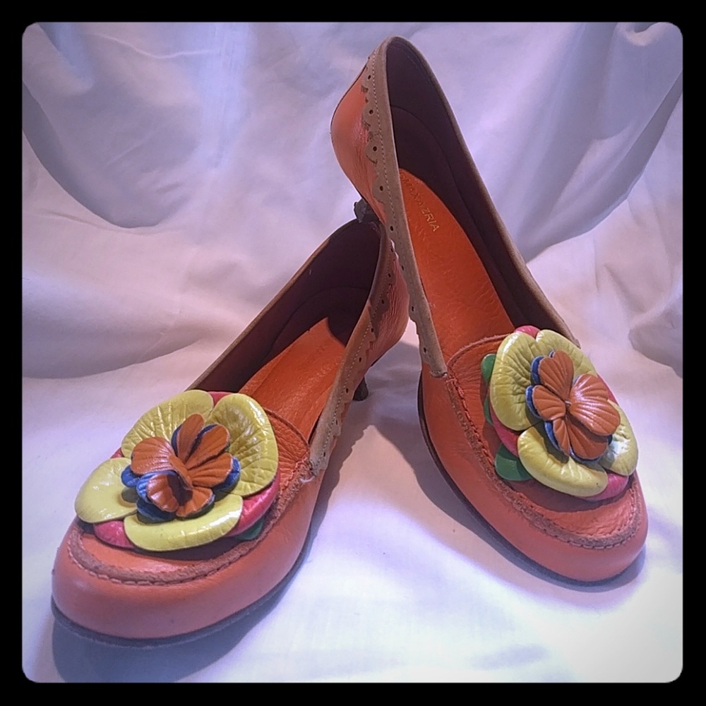 Orange low heel flats with flower detail