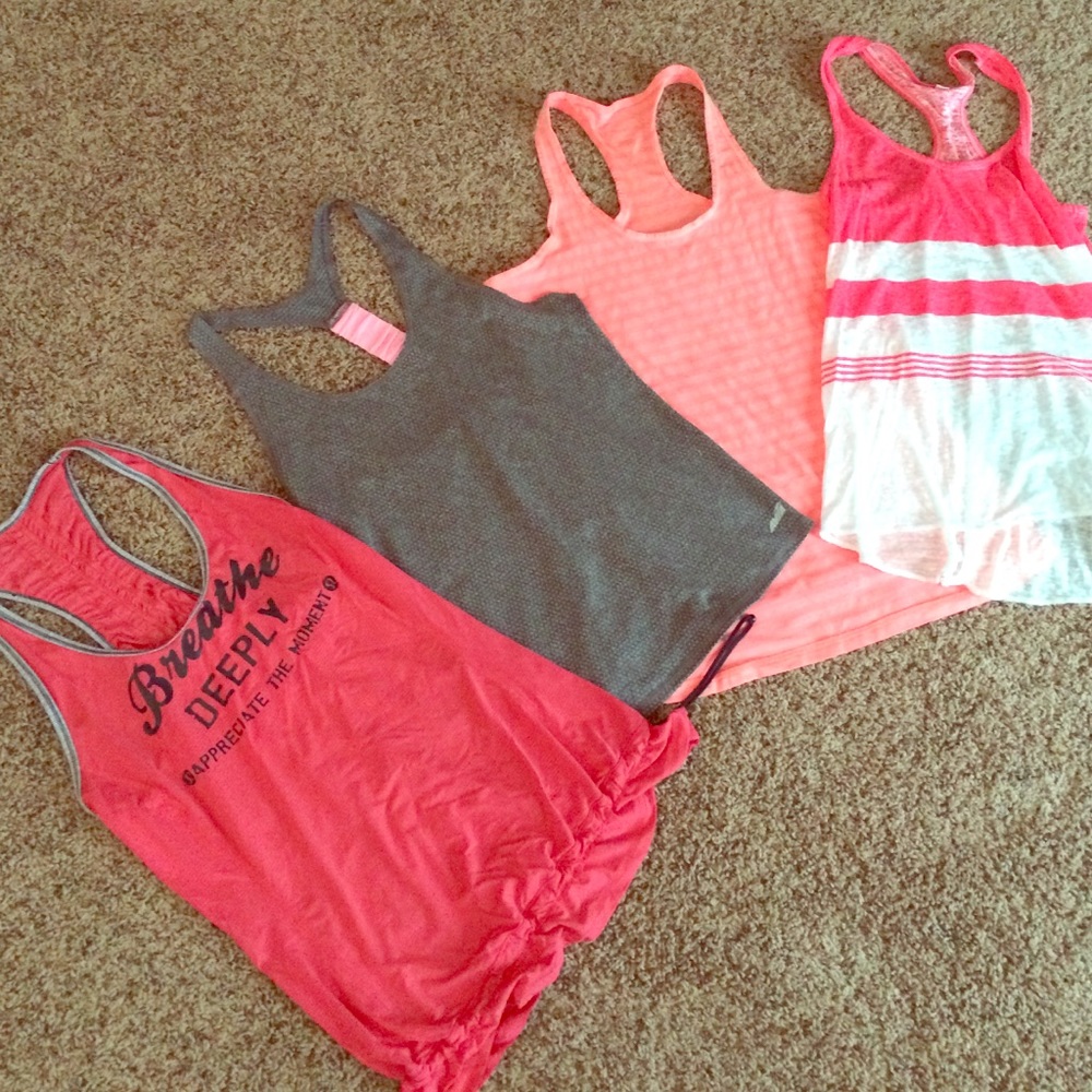 4 work out tanks. Lululemon medium!