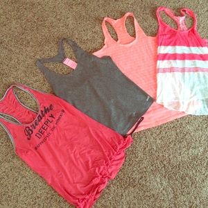 4 work out tanks. Lululemon medium!