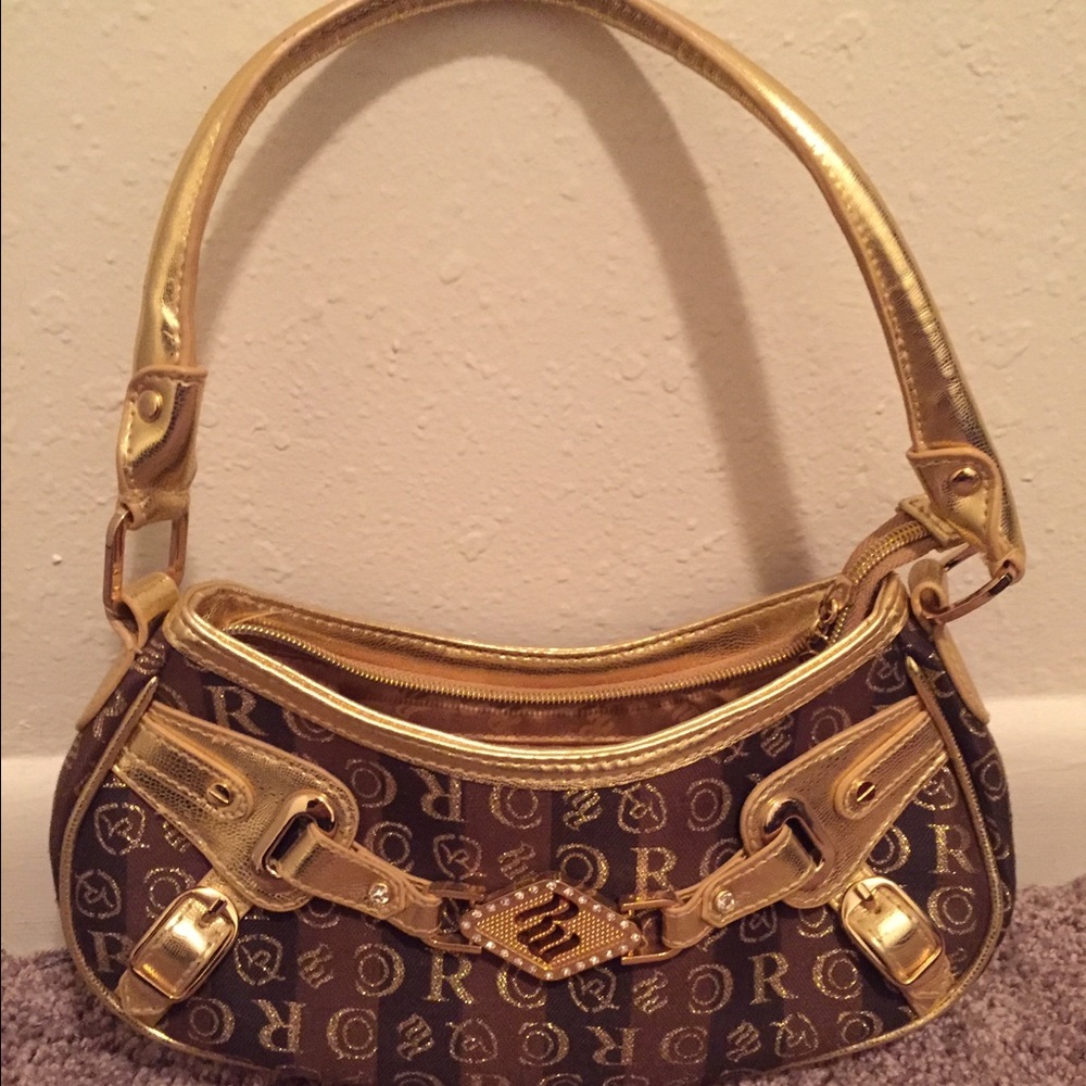 Gold Roca wear small purse