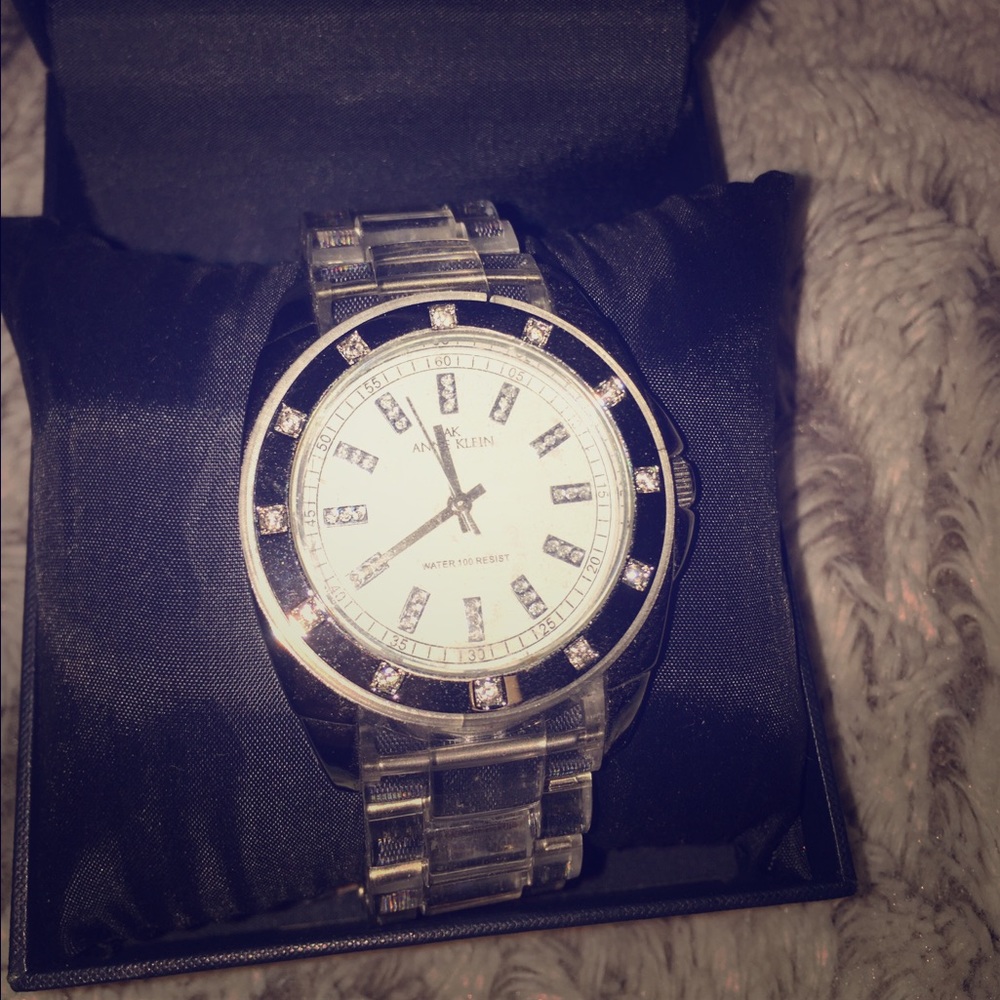 Anne Klein Watch w. diamonds on face & clear band