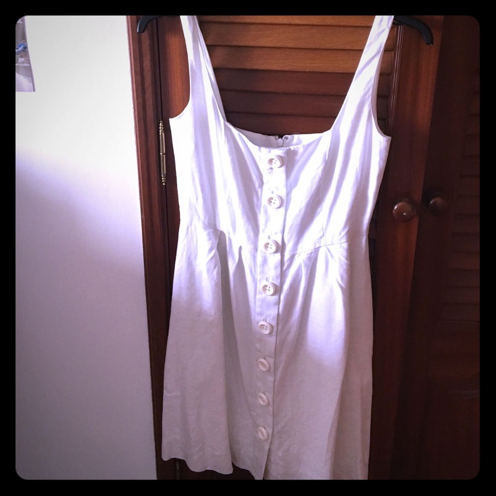 White dress with buttons on front