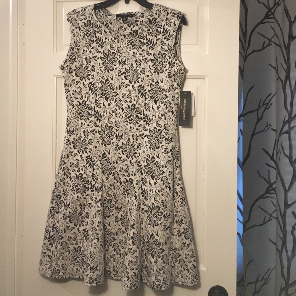 Black and white stretchy knee length dress size 8