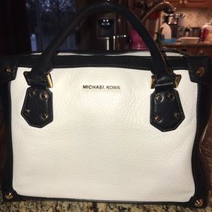 Black and white Michael Kors handbag with tag