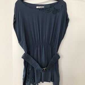 Blue tunic shirt with belt.