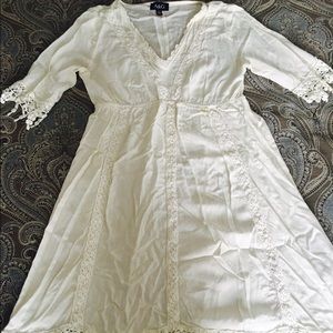 Cream boho chic dress with crochet detail.