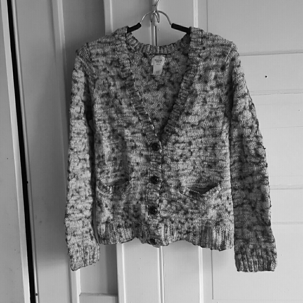 A cardigan sweater thing