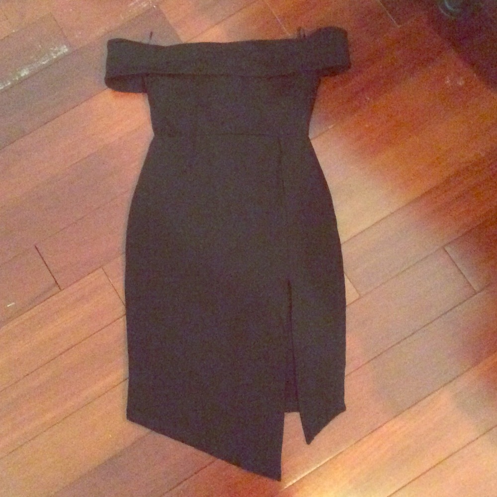 Off the shoulder black dress with slit