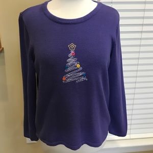 Purple embroidered Christmas sweater.