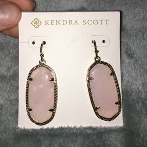 Light pink Kendra Scott earrings.