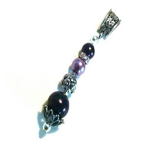 Purple pearl pendant in silver setting