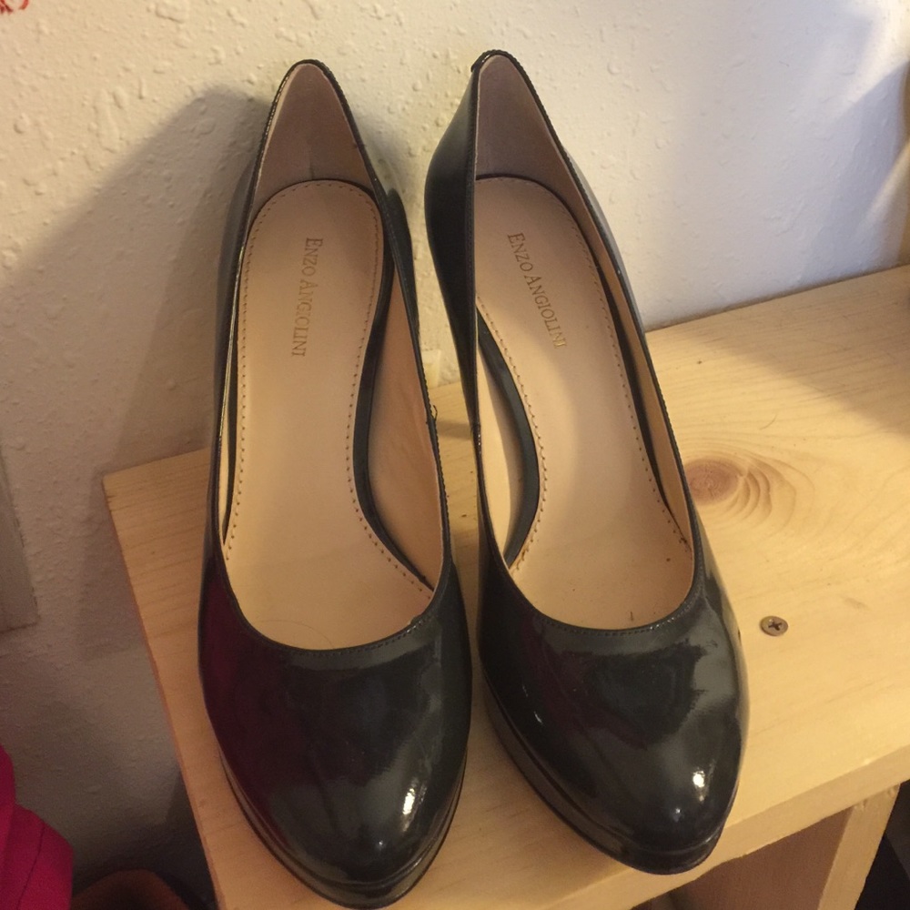 Navy patent leather pumps. Worn for a few hours.