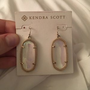 Clear iridescent Kendra Scott earrings.