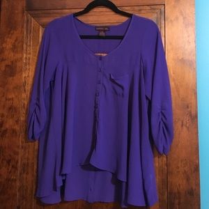 Purple flowy top.
