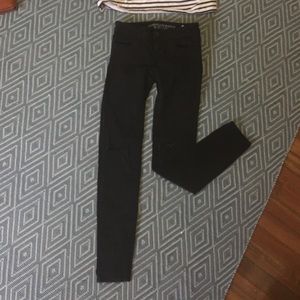 Black ripped knee jeans