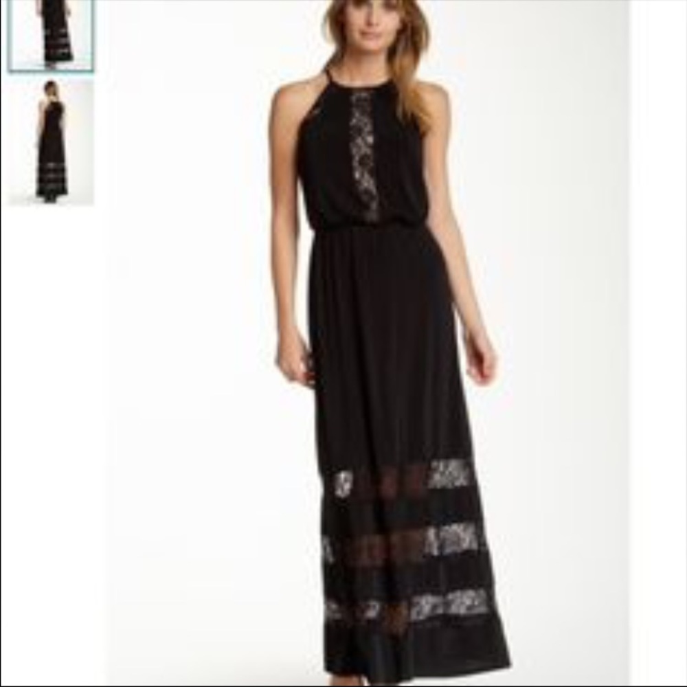 Black Maggy London maxi dress with lace trim.