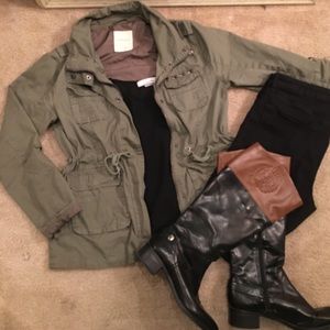 Tall black and brown boots.