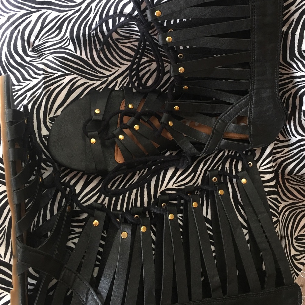 Black with gold accents- gladiator style