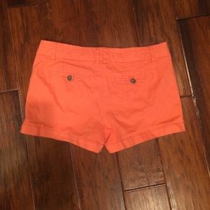 Bright coral shorts size 28.