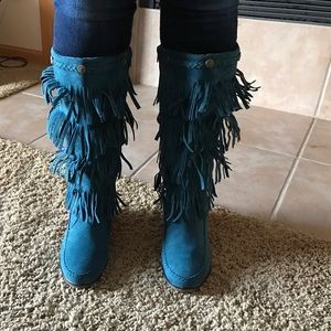 The brand is Shoes of Soul fringe wedge boots
