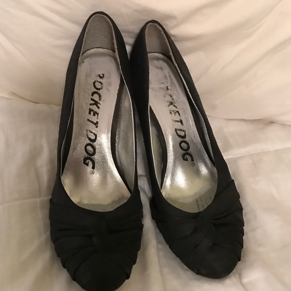 Well worn black pumps