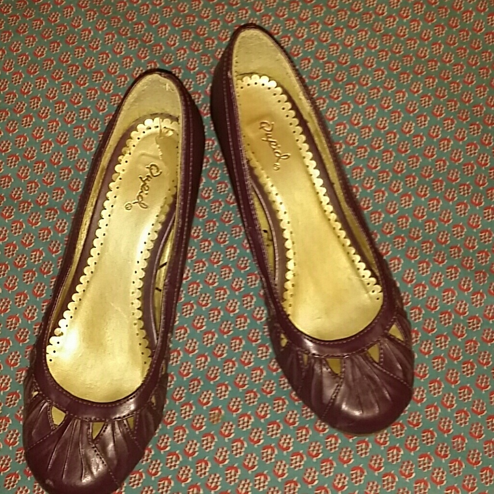 Purple wedge heel shoes