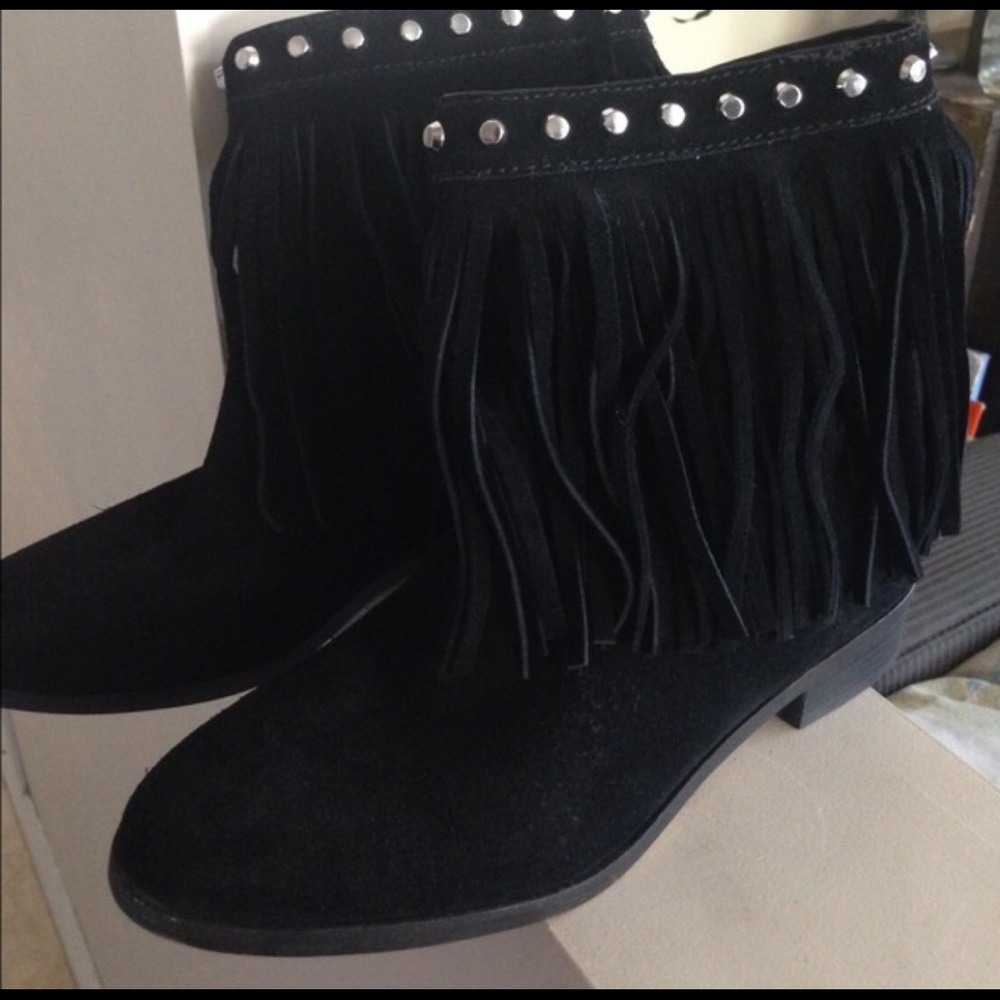 Black boots with silver color studs.