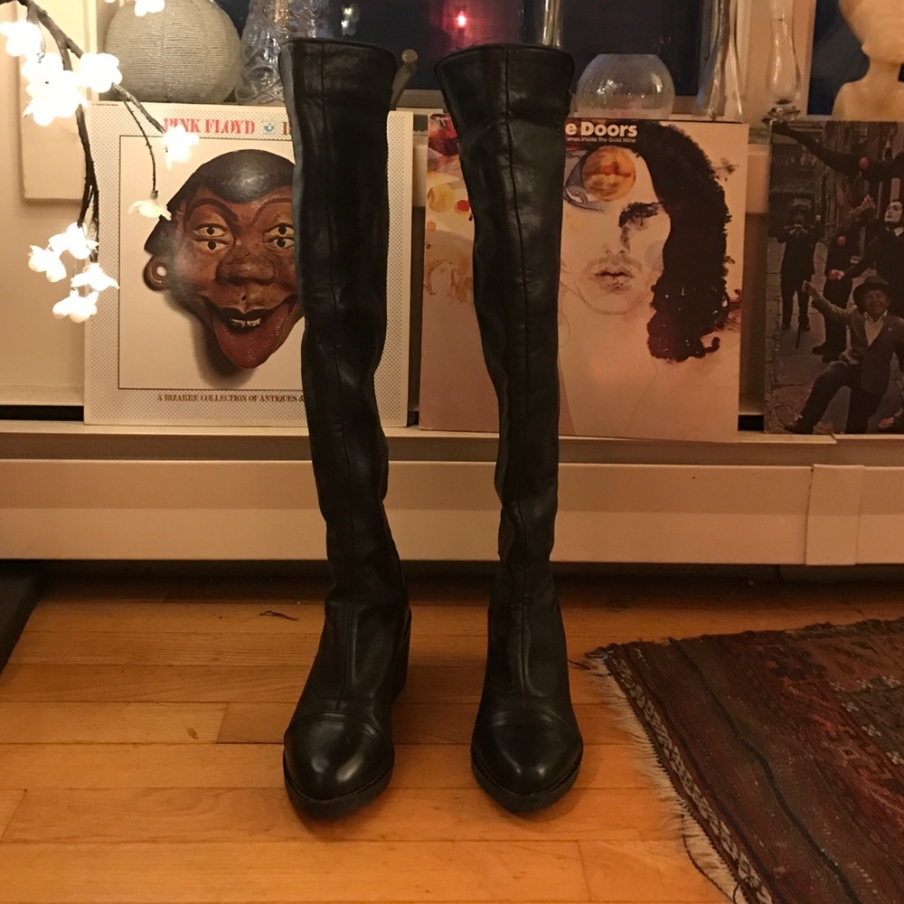 Over the knee black leather boots
