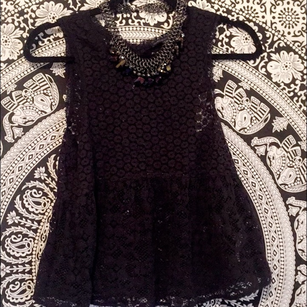Sheer lace peplum top