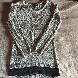 New maturity sweater with lace trim.