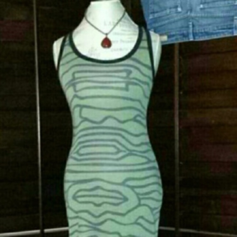 Green maxi type dress tight with design