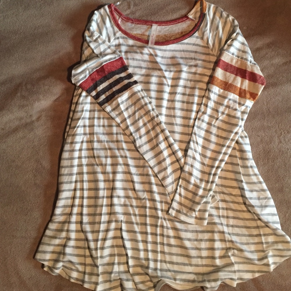 New, never worn trendy long sleeve.