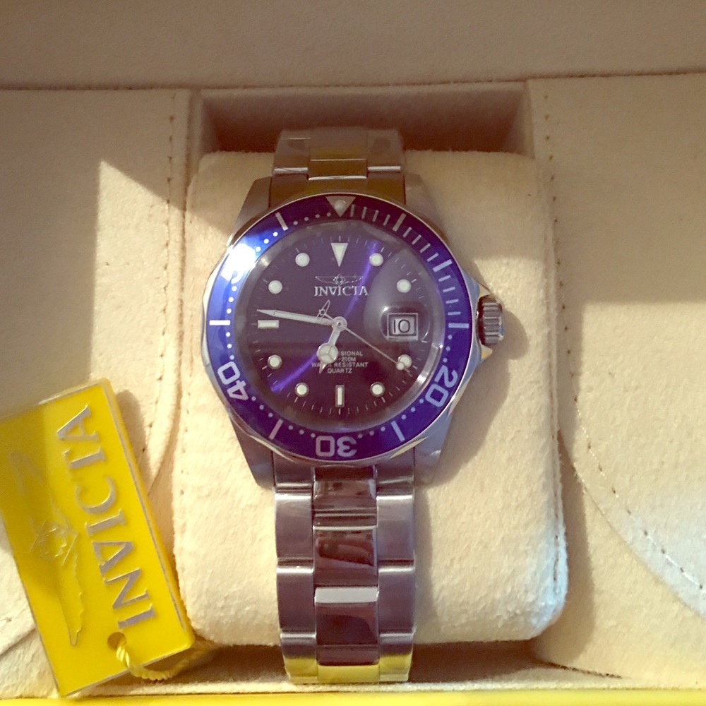 Silver Invicta watch w/date