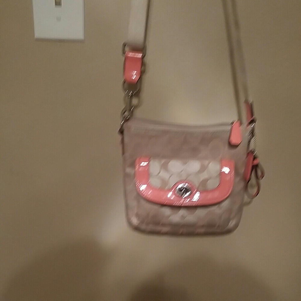 Pack and cream color authentic coach bag